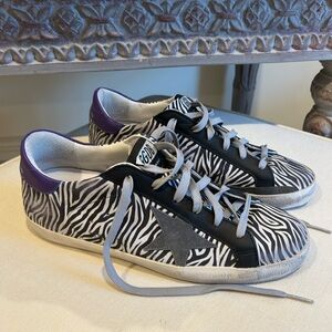 Golden Goose Super Star with Suede with purple heel tab.